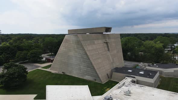 Aerial Rise showing off the brutalist church. alt