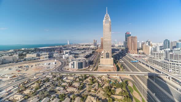 Skyline Internet City with Crossing Sheikh Zayed Road Aerial Timelapse alt