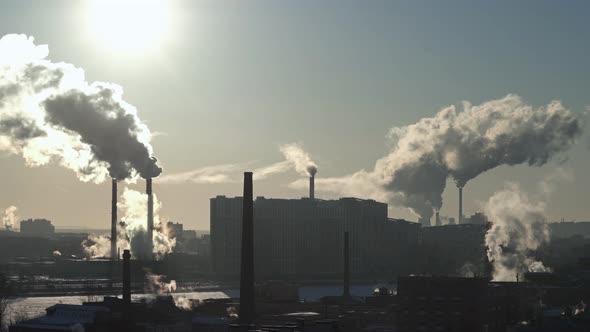 Smoke From Chimneys in City