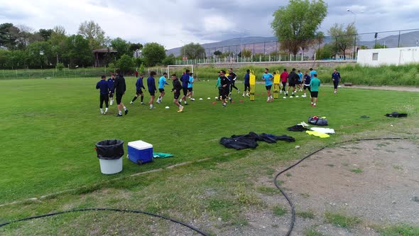 Soccer players training on field