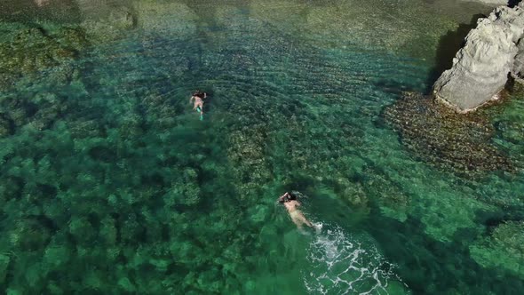 Swimming in an Unspoiled Mediterranean Seaside Beach