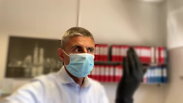Man Looking Around in the Office Wearing Mask During Coronavirus Outbreak Slow Motion alt