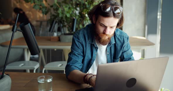 Male Working on Laptop