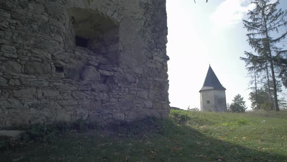 Tower and a stone wall alt