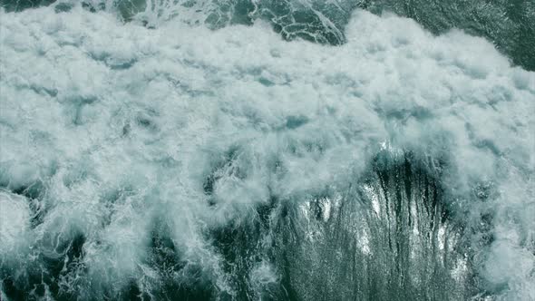 Drone Top Down over Stormy Ocean Waves