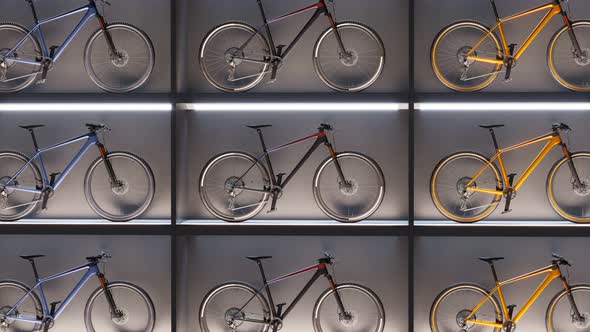 Luxury bike store wall exposition. Front view. Zoom-in. Mountain cycling. 4k HD alt