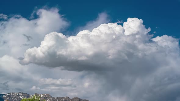 Timelapse of clouds moving over Timpanogos Mountain alt