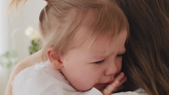 Closeup Sad Little Child Girl Daughter Baby Infant Crying with Tears Feels Sadness Ache Pain alt