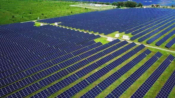 Aerial View of Powerful Station with Solar Panels Generates Electric Current with Help of Sunlight alt
