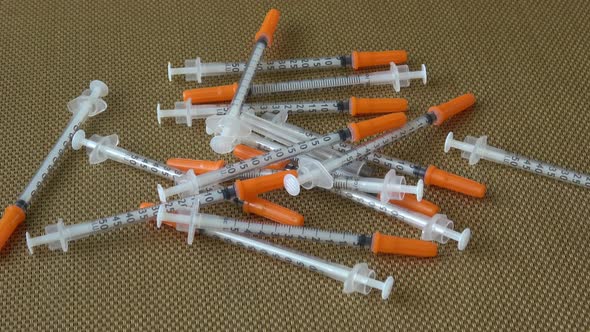 Insulin syringes for diabetes. Medical syringe. Many syringes