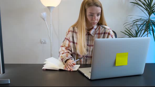 The Girl Is a Freelancer Writes in a Notebook Ideas alt