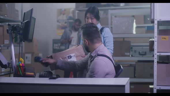 Workers Checking Damaged Package alt