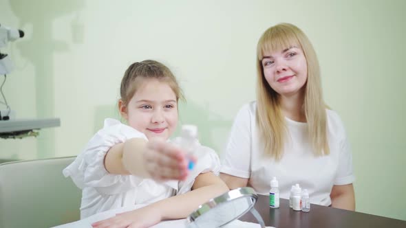 the Girl with a Case of Orthokeratological Contact Lenses alt