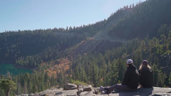 Pan Across Overlook As Couple Enjoys Emerald Bay Lake Tahoe