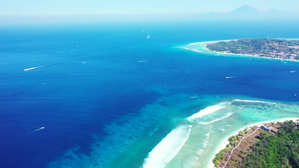 Misty morning sky over deep blue sea around tropical islands of Indonesia, perfect gateway for vacat alt