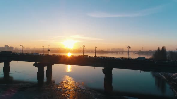 Sunset Over the Bridge in the City alt