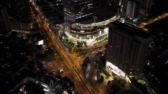 Bangkok business district city center above Samyan intersection and traffic, during night