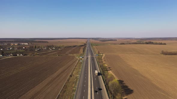 Aerial View of a Beautiful Motorway Along the Fields