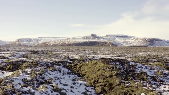 Mossy Lava Fields of Iceland in the Winter Flyover alt