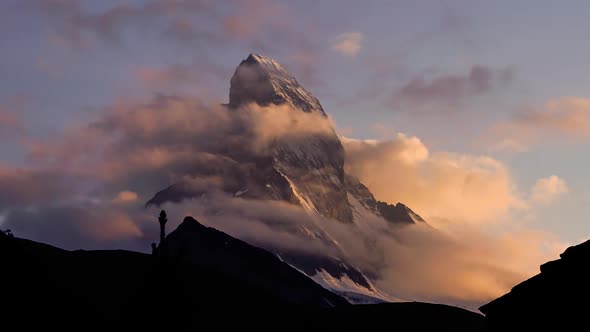 Timelapse of the Matterhorn mountain from Zermatt Village during sunset alt