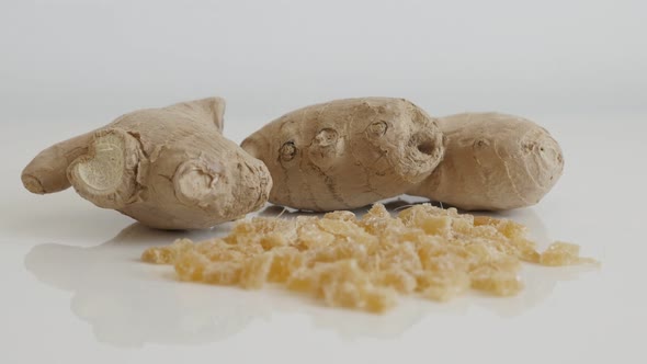 Close-up of  crystallized   Zingiber officinale slow tilt 4K 2160p 30fps UltraHD footage - Sweet and alt