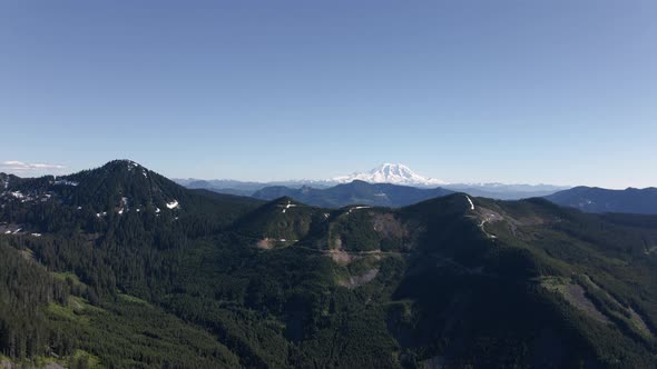 Washington Cascade Mountains Aerial With Mt Rainier And Spring Blue Sky alt