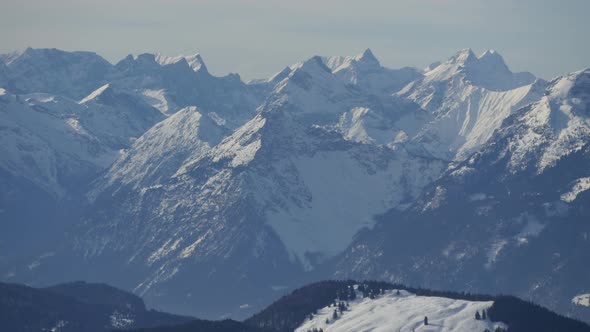 Panoramic view of mountains during winter alt