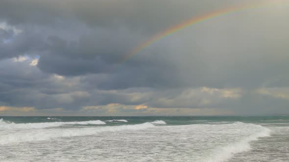 Rainbow over the Stormy Sea