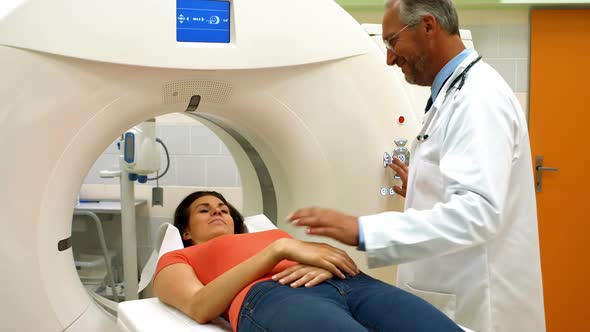 Doctor consoling a patient before mri scan at the hospital 4k alt