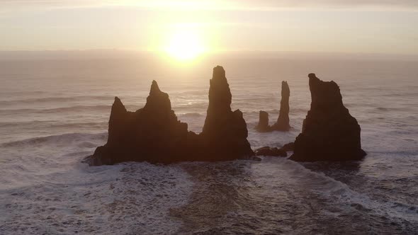 Drone Over Reynisdrangar Sea Stacks At Sunset alt