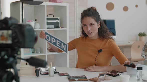 Beauty Blogger Showing Open Label alt