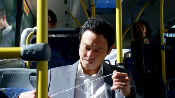Male commuter travelling in bus 4k alt