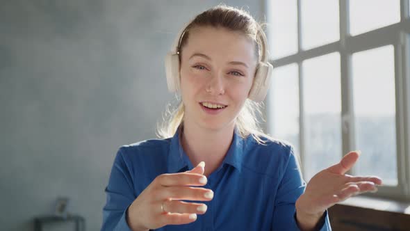 Cheerful Woman Wear Headset Laugh Using Laptop Video Stream Conference Call Teach Online, Happy Girl alt