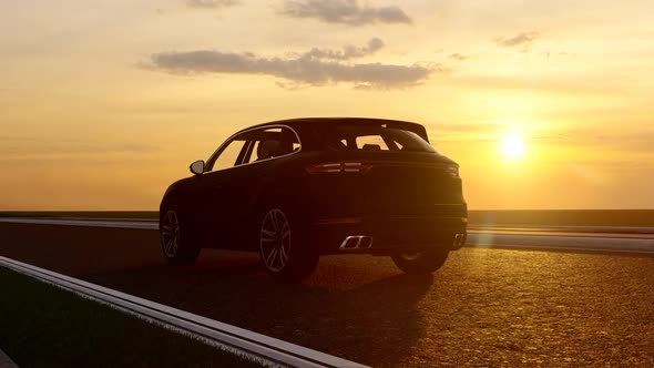Black Sport SUV and Sunset Landscape