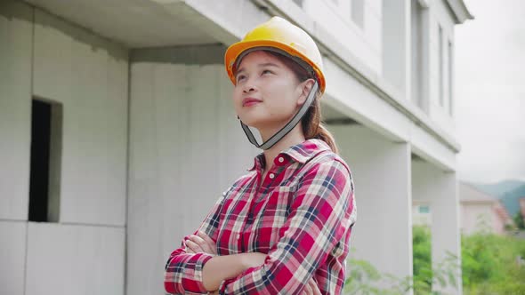 Young woman construction site engineer,close up.