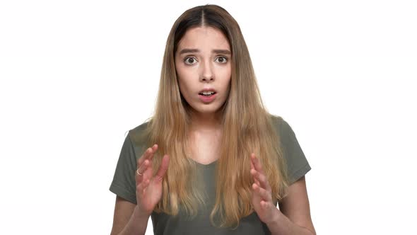 Portrait of Caucasian Woman 20s Reacting with Sadness on Face and Expressing Disappointment Isolated alt