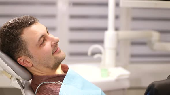 A person who treats teeth examined by a dentist, healthy teeth alt