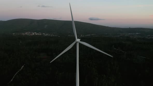 Wind Turbines Spinning Slowly On Dense Foliage Forest In Serra de Aire e Candeeiros, Leiria,Portugal