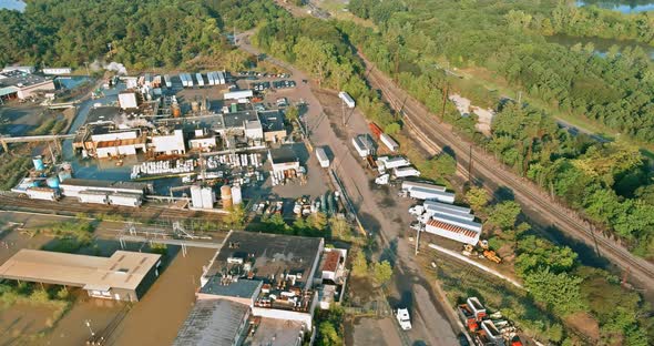 Aerial Panoramic View of Tanks for Chemical Mixing Industrial Plant with Chemical Industry System alt