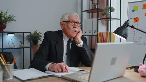 Senior Business Office Man Analyzes Financial Charts Celebrate Success Win at Home Workplace Desk alt