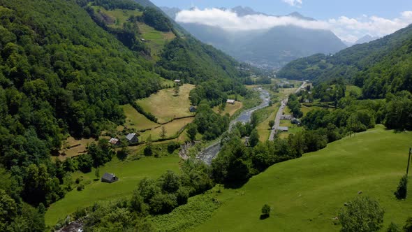Aerial view of natural mountain valley with serpantine road. Pyrenees alt