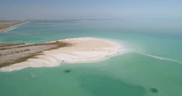 Aerial view of colourful sinkholes. The Dead sea, Negev, Israel. alt