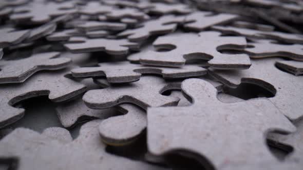 Pile of Randomly Lying Puzzle or Jigsaw Pieces alt