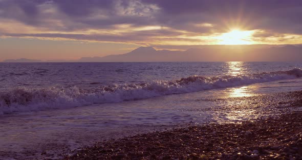 Beautiful Sunset at Beach with Golden Sun Reflection on the Sea