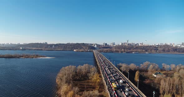 Car Traffic on the Bridge at the Modern City Aerial View alt