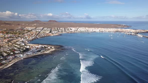 Aerial View of Waves Crashing on the Bay of Corralejo, Fuerteventura