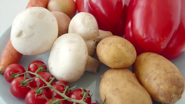 Professional Shot of a Vegetables Composition Cherry Tomatoes Carrots Potatoes Peppers Mushrooms