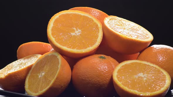 Fresh Oranges Cut and Whole Gyrating alt