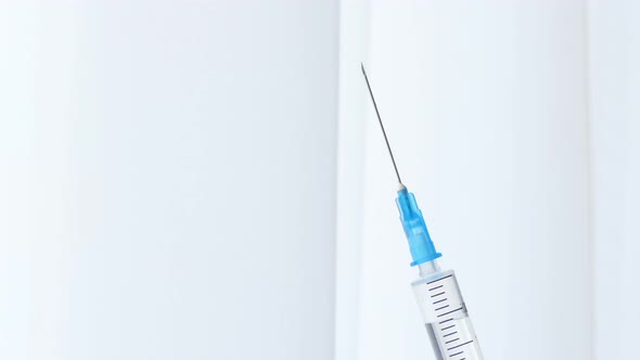 Close Up of Injection Liquid Being in Syringe