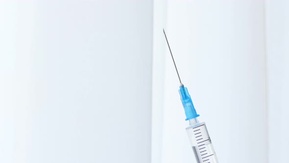 Close Up of Injection Liquid Being in Syringe alt